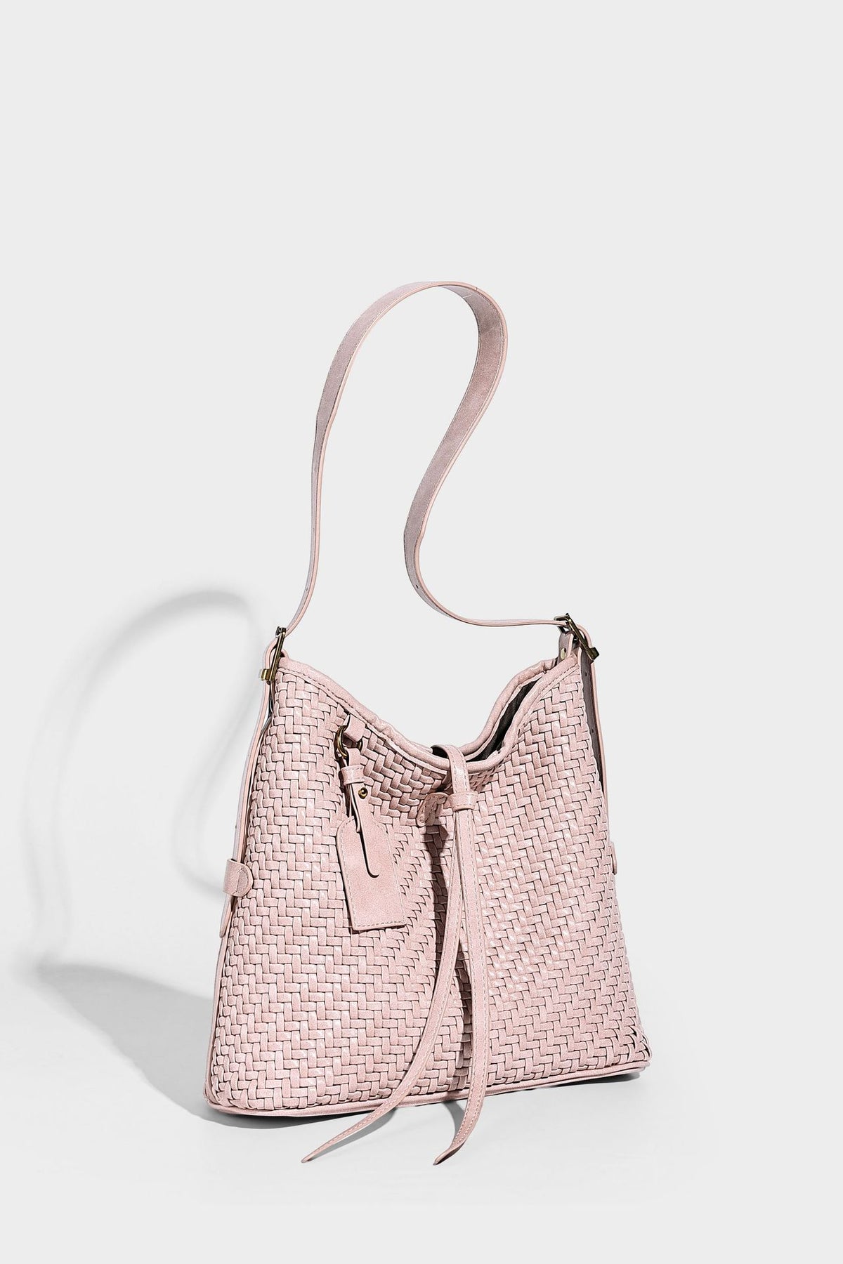Slouchy woven-texture bucket shoulder bag with tassel tie closure and gold-tone hardware, detail view 21