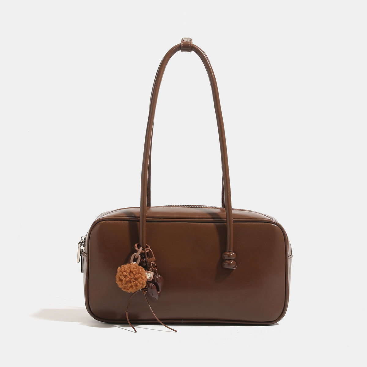 Kastenförmige, rechteckige Bowling-Schultertasche mit glänzender Lederoptik, zwei abgerundeten Tragegriffen, Reißverschluss oben und abnehmbarem