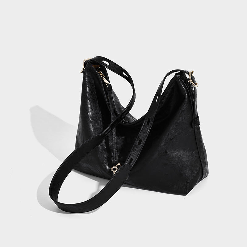 Slouchy leather-look hobo shoulder bag with gold-tone hardware and adjustable strap in brown, detail view 19