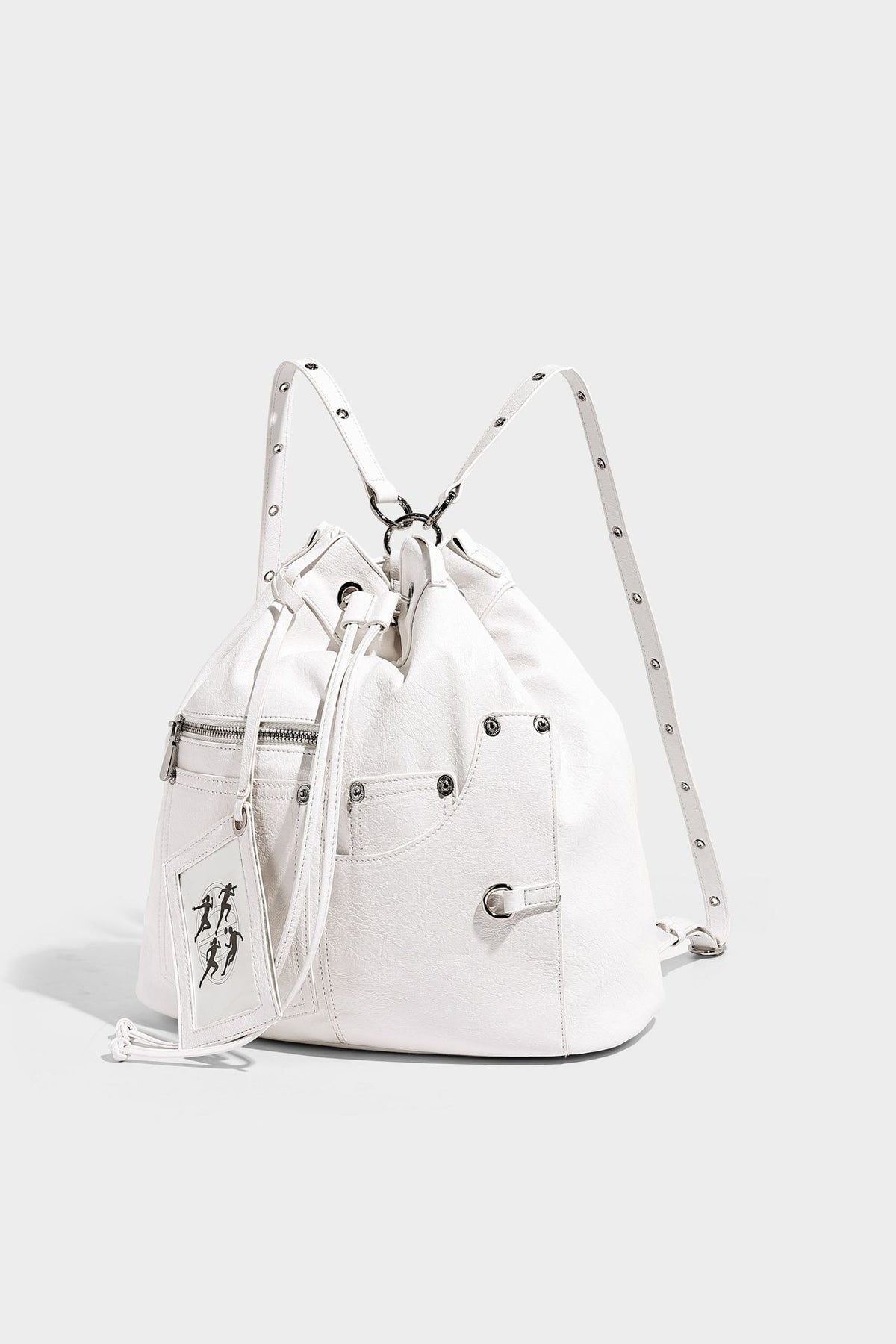 Glossy black convertible bucket backpack with silver grommet-studded straps, drawstring cinch closure, and front zip pocket
