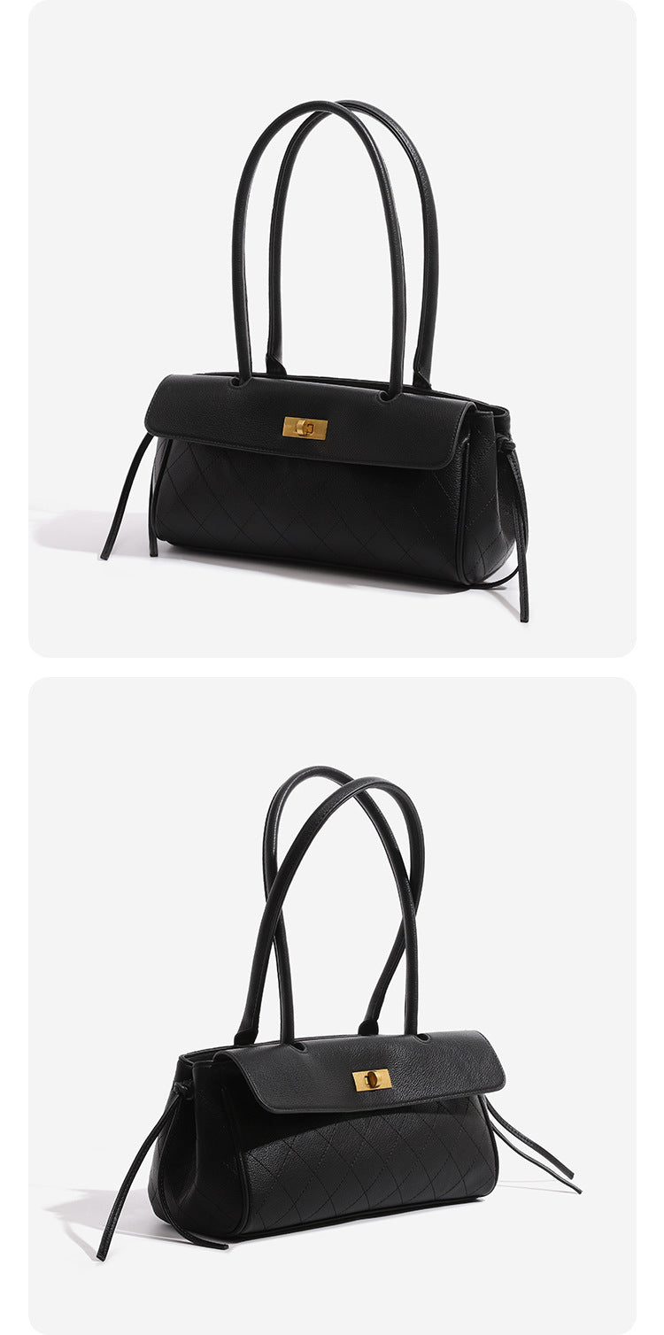 Structured quilted diamond top-handle underarm shoulder bag with gold-tone turn-lock flap closure and side tie straps, detail