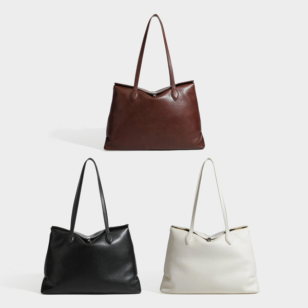Large leather-look tote shoulder bag with slim double straps and silver-tone turn-lock closure, detail view 2