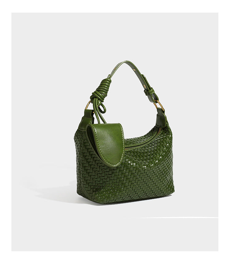 Small glossy basket-weave hobo shoulder bag in brown with knotted top handle, flap accent pocket, and gold-tone hardware