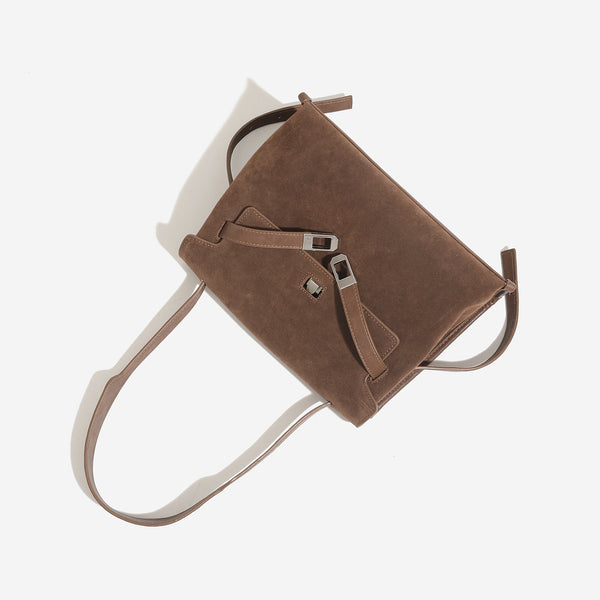 Structured retro flap satchel bag with turn-lock closure, adjustable shoulder strap, and silver-tone hardware, detail view 4