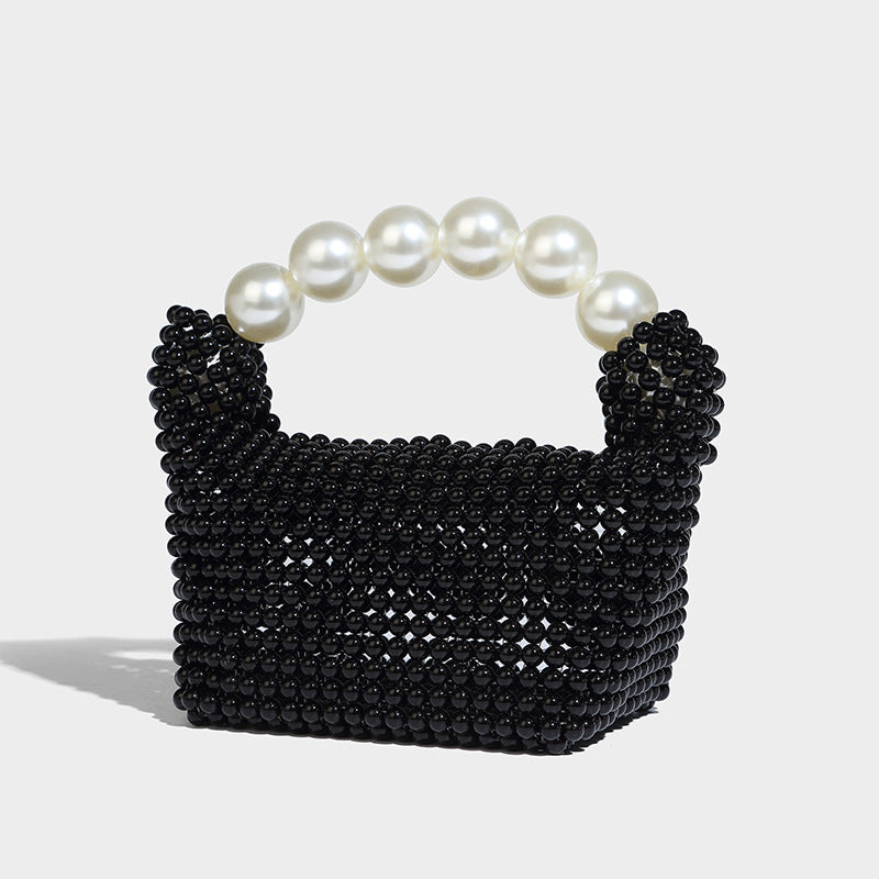 Kleine, formstabile Mini-Henkeltasche mit Kunstperlenbesatz, übergroßem bogenförmigem Perlenhenkel und abnehmbarem Perlen-Crossbody-Riemen