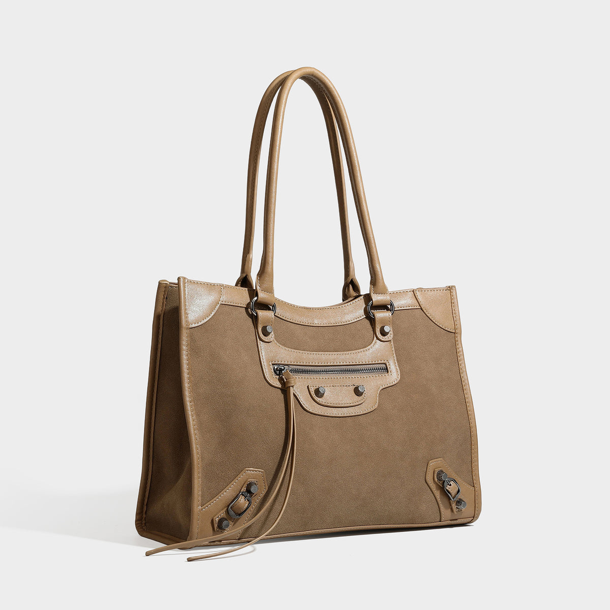 Large structured tote bag with matte suede-like body, smooth leather-look trim, front zip pocket, stud hardware, and