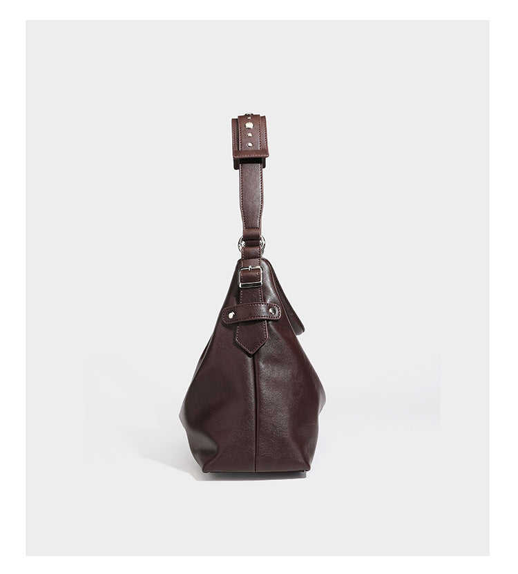 Large slouchy hobo shoulder bag in dark brown with smooth leather-look finish, adjustable strap, and silver-tone hardware