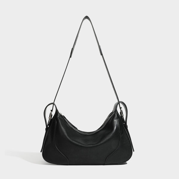 Slouchy crescent hobo shoulder bag in dark brown pebbled leather-look finish with zip top and long shoulder strap, detail