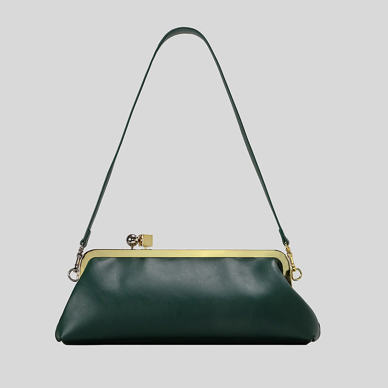 Strukturierte Clutch mit Kiss-Lock-Rahmenverschluss aus dunkelbrauner, krokodil-geprägter Lederoptik mit goldfarbenen Details und schmalem