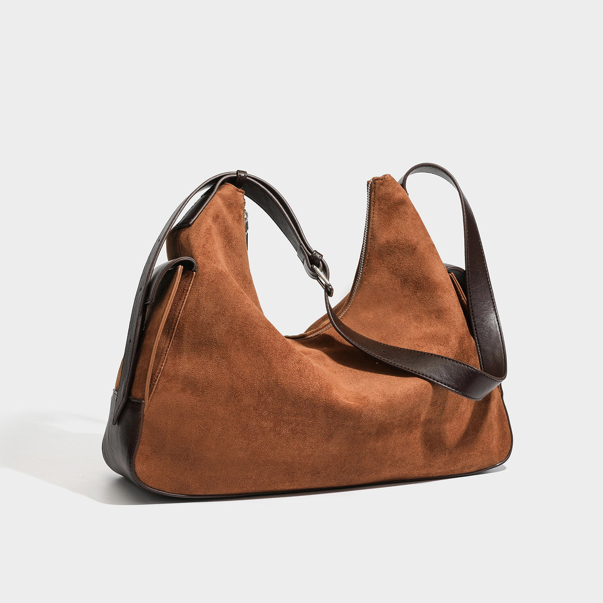 Slouchy cognac brown matte suede-look hobo shoulder bag with dark brown leather-look trim, top zip closure, front flap