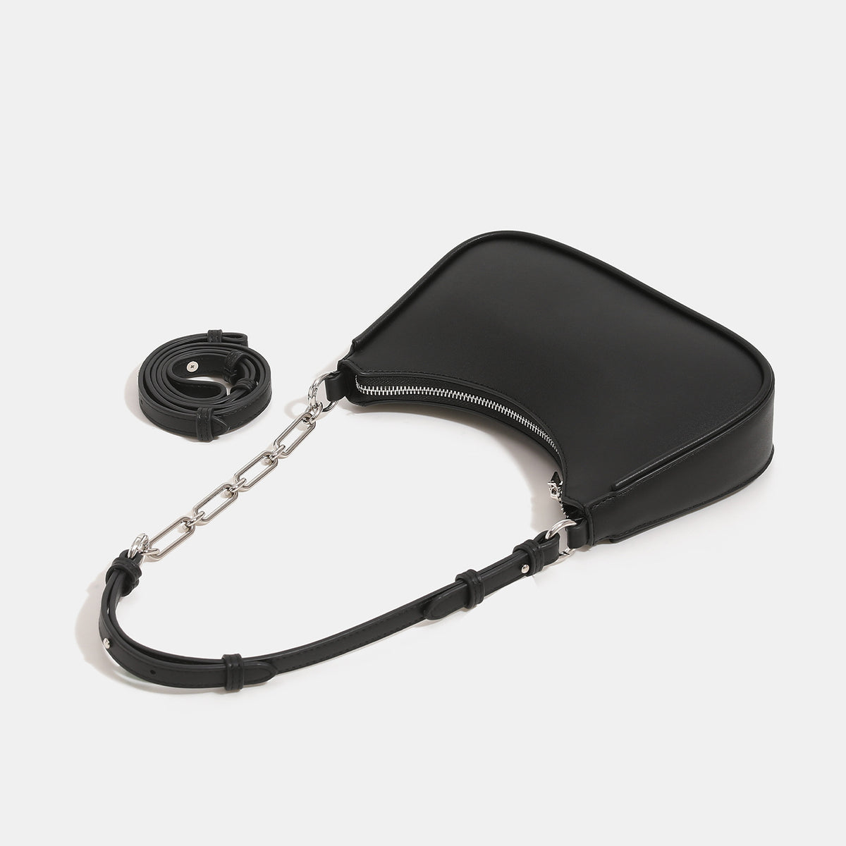 Compact crescent half-moon shoulder bag with chain-and-leather adjustable strap and silver-tone hardware, detail view 4