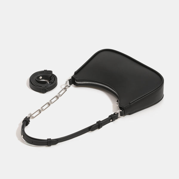 Compact crescent half-moon shoulder bag with chain-and-leather adjustable strap and silver-tone hardware, detail view 4