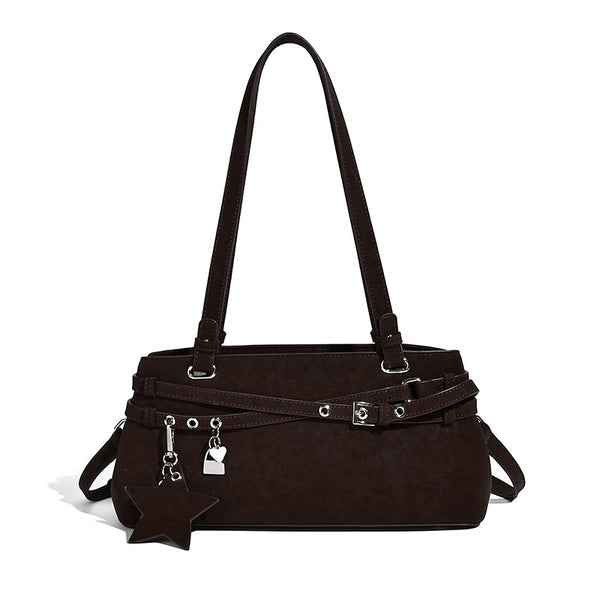 Structured trapezoid shoulder tote in dark brown matte suede-look finish with dual straps, wraparound belt bands