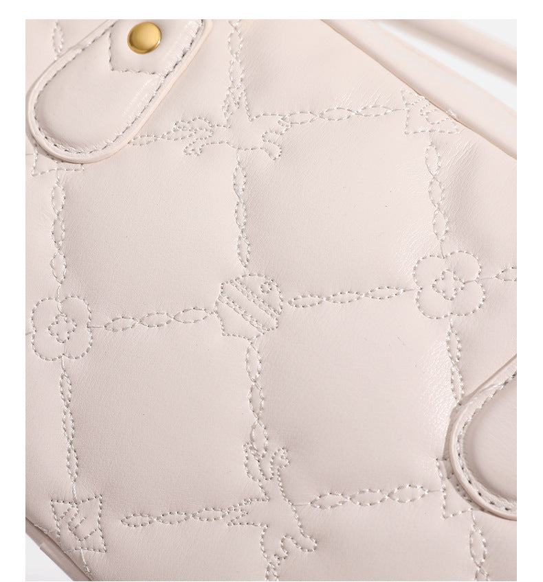 Small structured quilted leather-look zip shoulder bag with gold-tone hardware and adjustable strap, detail view 21