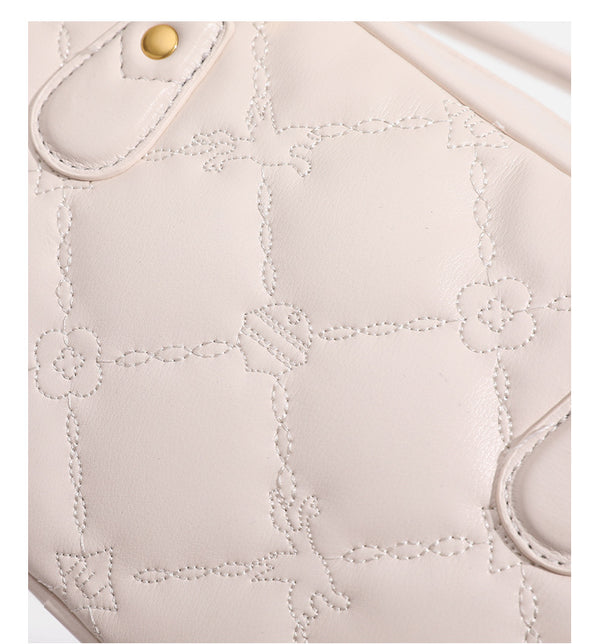 Small structured quilted leather-look zip shoulder bag with gold-tone hardware and adjustable strap, detail view 21