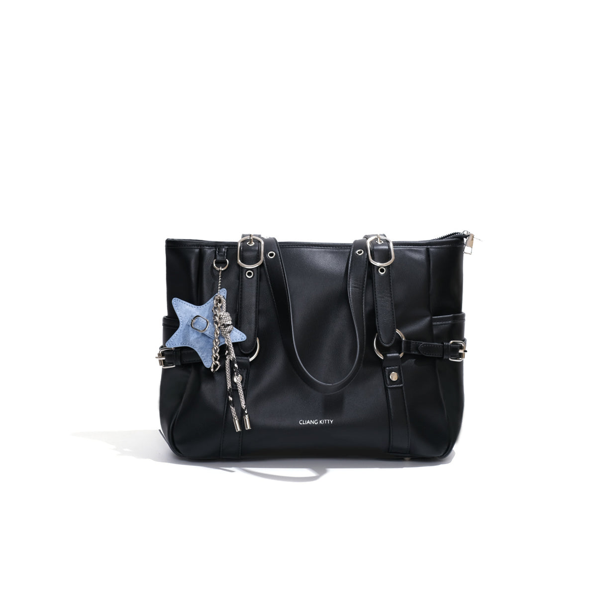 Large structured black leather-look tote bag with zip top, silver-tone hardware, side buckle straps, and detachable denim