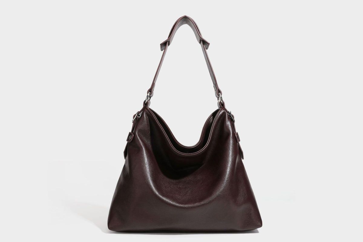 Large slouchy hobo shoulder bag in dark brown with smooth leather-look finish, adjustable strap, and silver-tone hardware