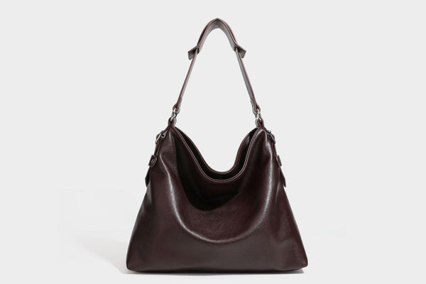 Large slouchy hobo shoulder bag in dark brown with smooth leather-look finish, adjustable strap, and silver-tone hardware
