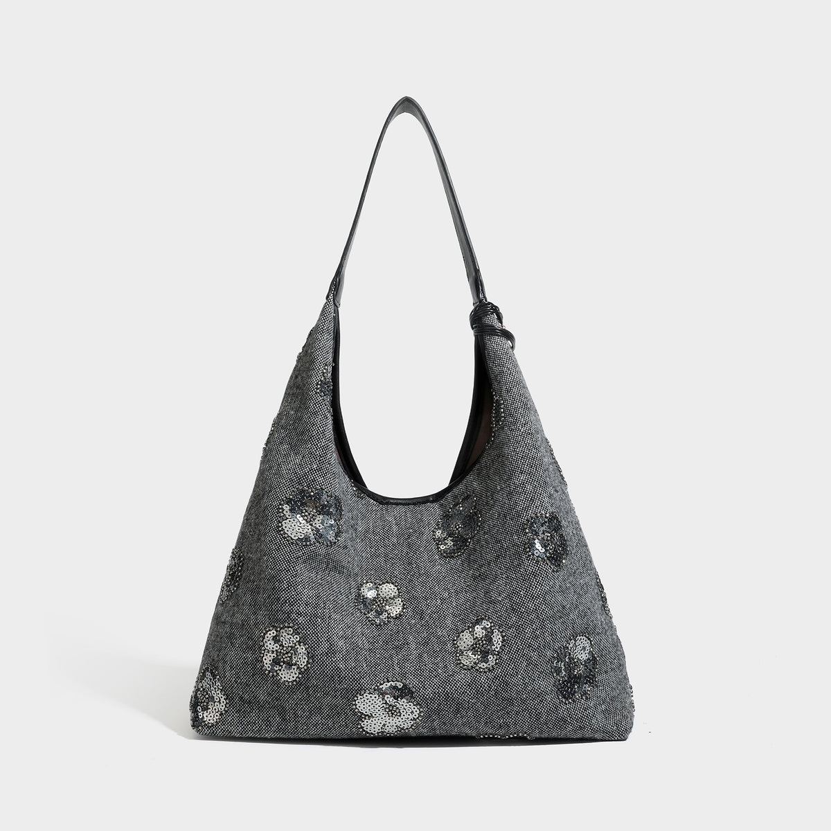 Lässige Trapez-Schulter-Tote in Anthrazit mit floralen Motiven aus silberfarbenen Pailletten, Trageriemen in Lederoptik und herabhängendem, perlenverziertem