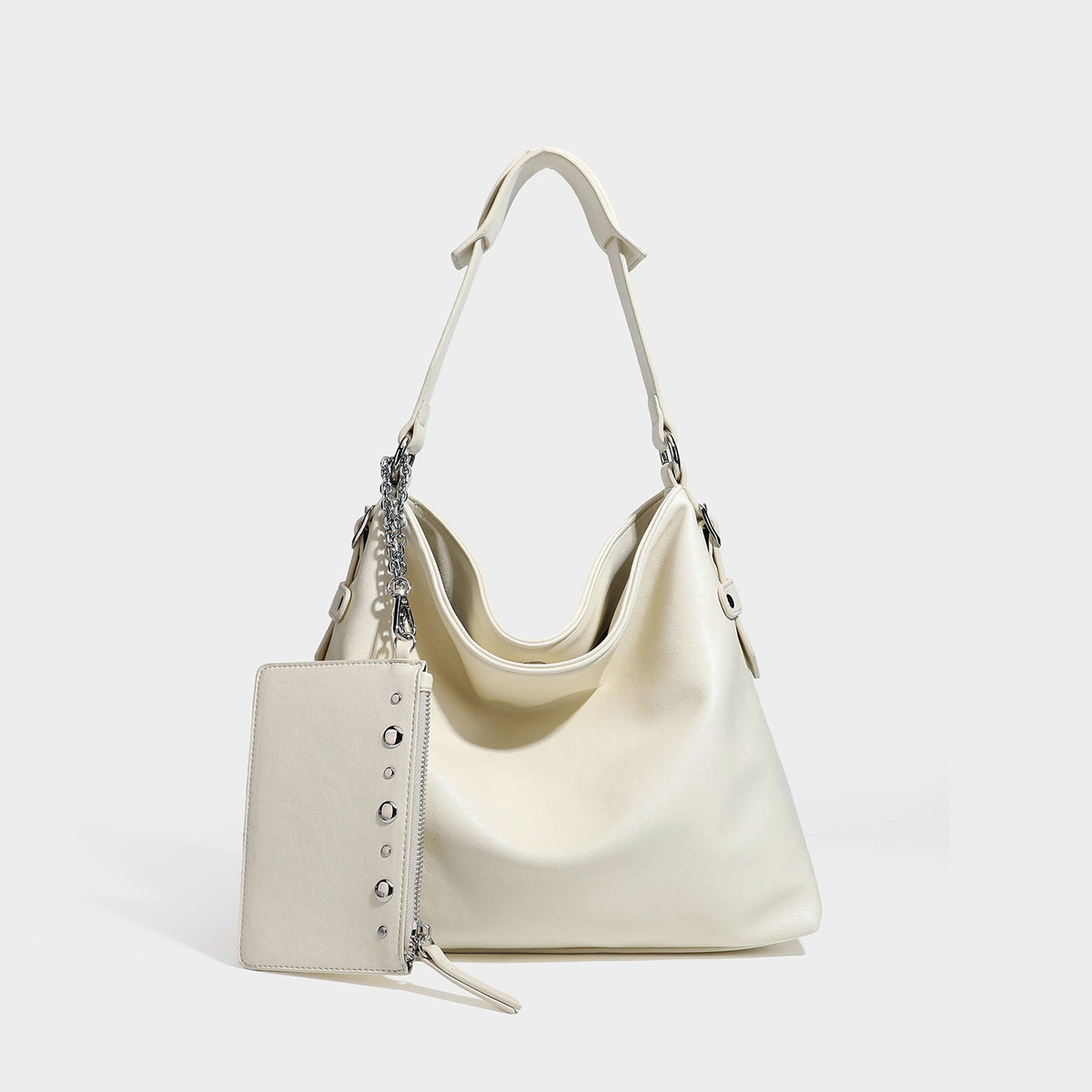 Large slouchy hobo shoulder bag in dark brown with smooth leather-look finish, adjustable strap, and silver-tone hardware