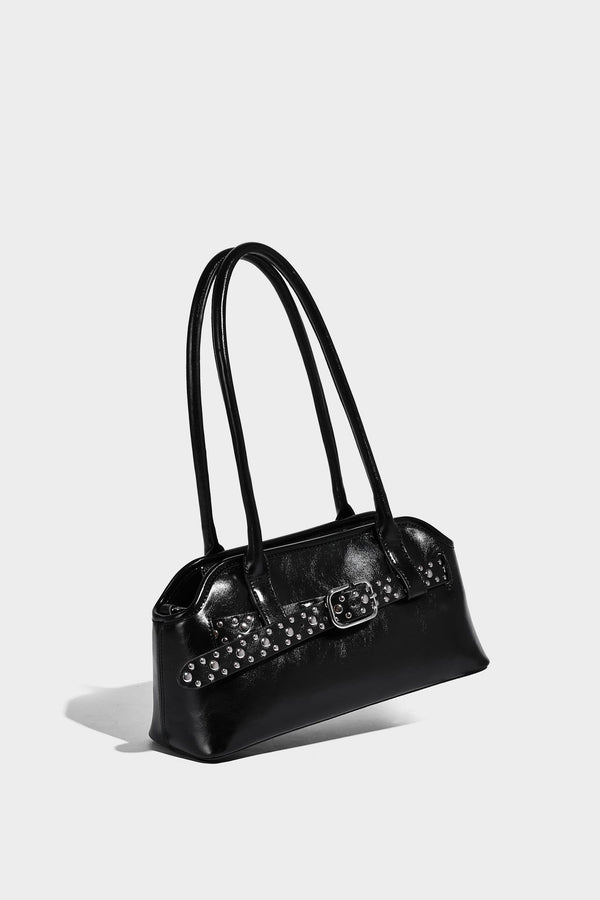 Strukturierte dunkelbraune Satchel-Tasche mit Öl-Wachs-Finish, vorderer Gürtelschnalle, goldfarbenen Beschlägen, zwei Tragegriffen oben und, Detail