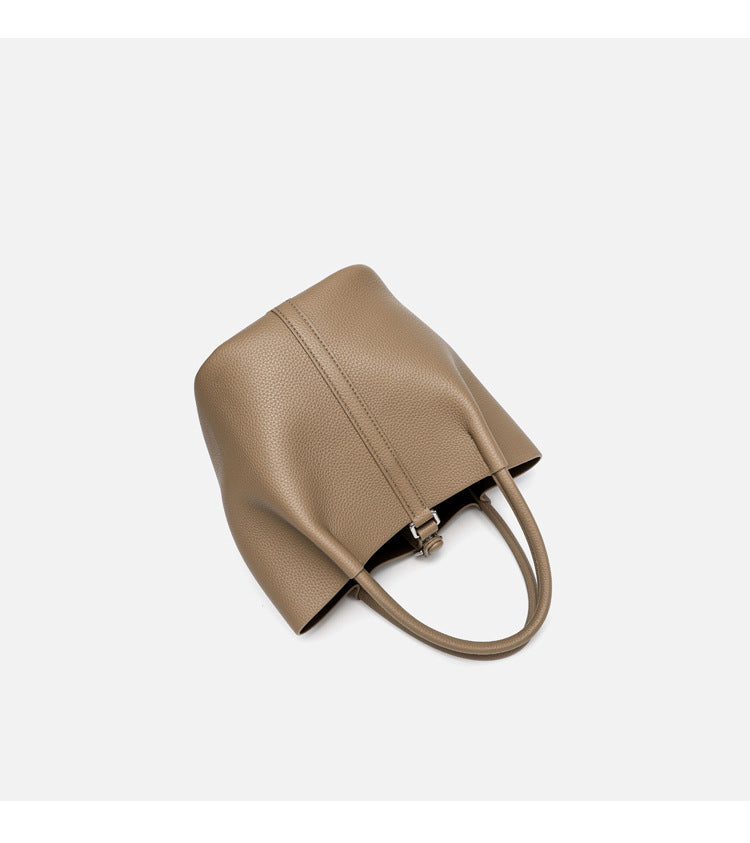 Pebbled leather-look bucket tote bag with rounded top handles and detachable shoulder strap, detail view 14