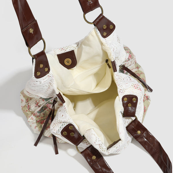 Cream floral patchwork hobo tote bag with crochet lace trim and brown leather-look shoulder straps, detail view 4