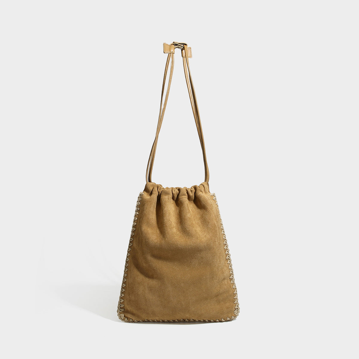 Matte suede-look drawstring bucket bag with cream braided woven edge trim and slim adjustable leather-look shoulder strap
