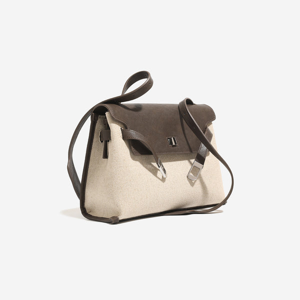 Structured retro flap satchel bag with turn-lock closure, adjustable shoulder strap, and silver-tone hardware, detail view 3