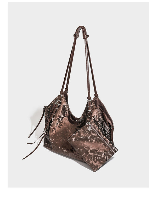 Slouchy crinkle-finish shoulder tote bag with silver hardware and attached zip pouch, detail view 7
