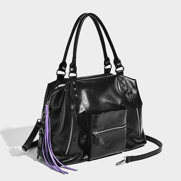 Glänzende strukturierte Henkeltasche im Tote-Stil mit zwei Tragegriffen, abnehmbarem Umhängeriemen, Reißverschlusstaschen auf der Vorderseite und Beschlägen in Silberoptik