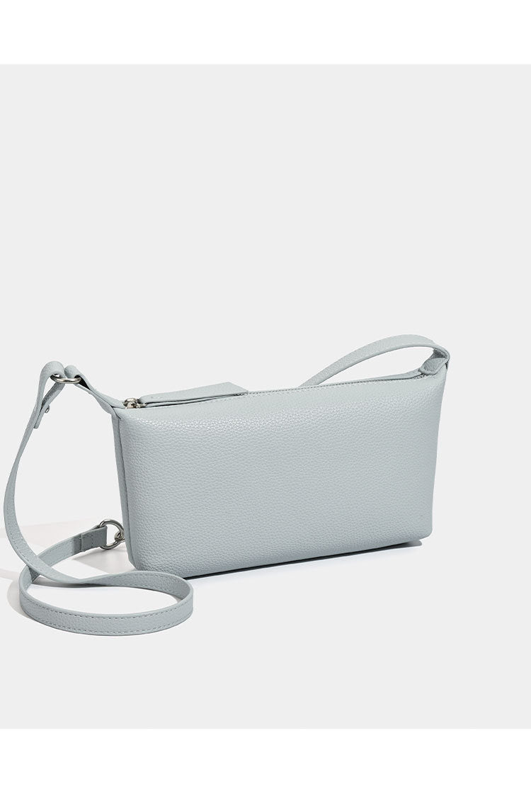 Small pebbled zip-top hobo bag with detachable adjustable strap and silver-tone hardware, detail view 9