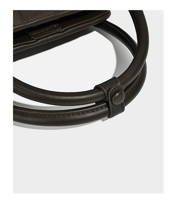 Small structured woven-panel mini tote bag with double top handles and detachable crossbody strap in matte leather-look