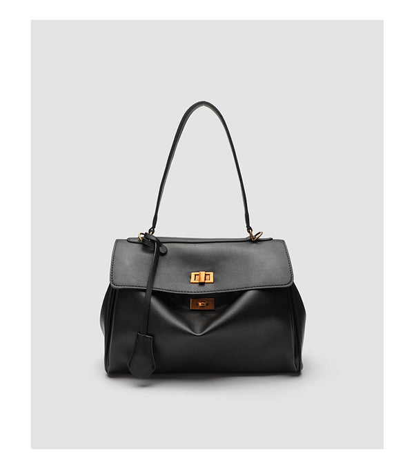 Structured black leather-look flap satchel bag with silver turn-lock hardware and top handle, detail view 20