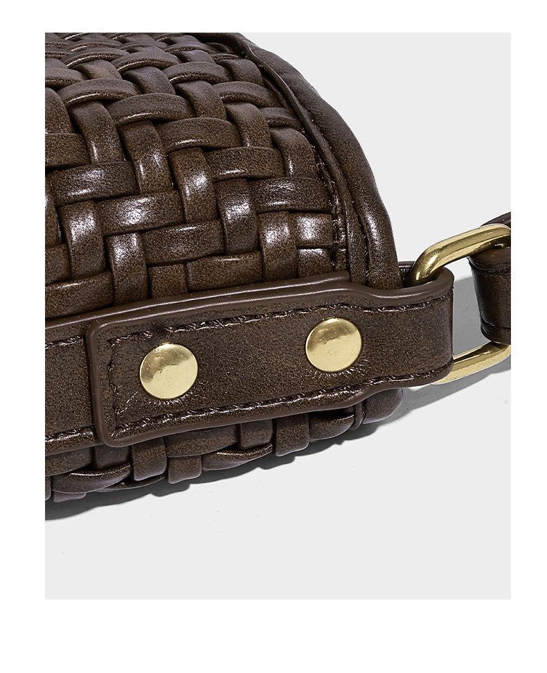 Woven leather-look bucket bag with basket-weave texture, attached mini pouch, and adjustable shoulder strap, detail view 16