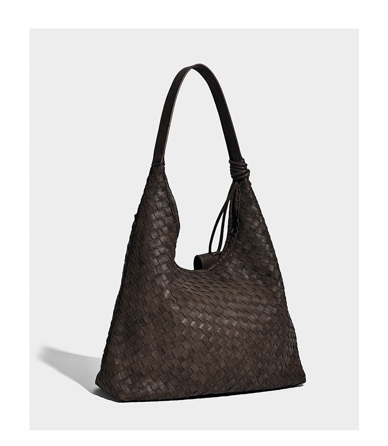 Slouchy woven hobo shoulder bag with knotted strap and matte leather-look textured finish, detail view 11