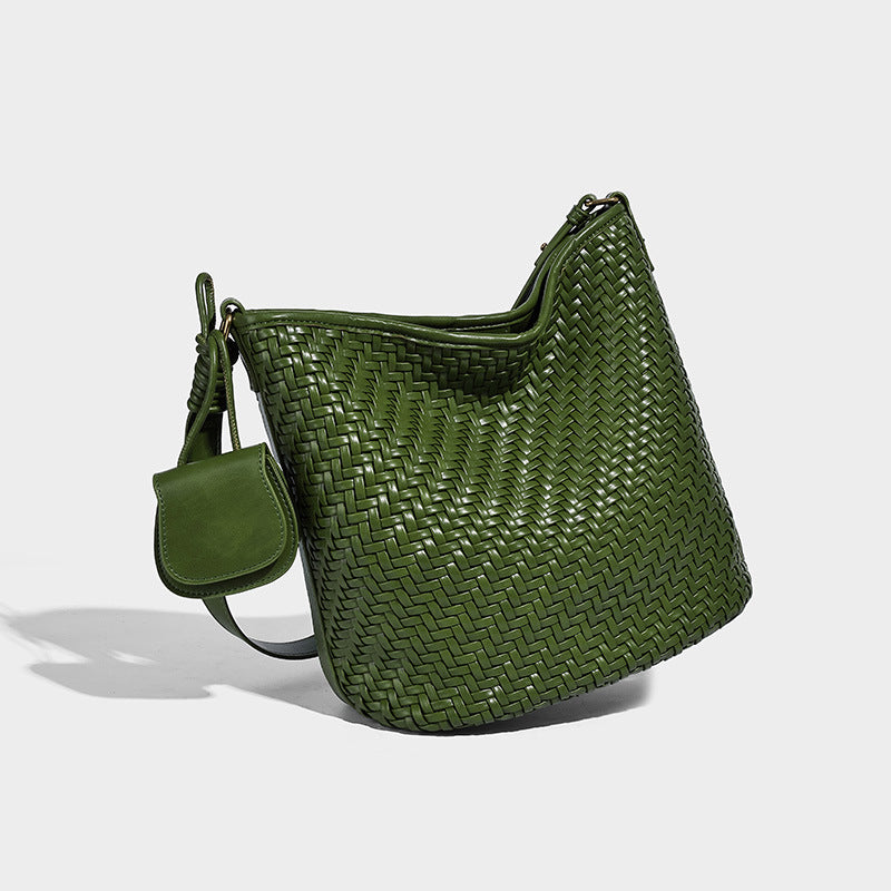 Woven leather-look bucket bag with basket-weave texture, attached mini pouch, and adjustable shoulder strap, detail view 4