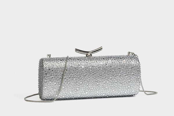 Structured rectangular hard-case clutch bag covered in all-over rhinestone crystal embellishment with curved kiss-lock top