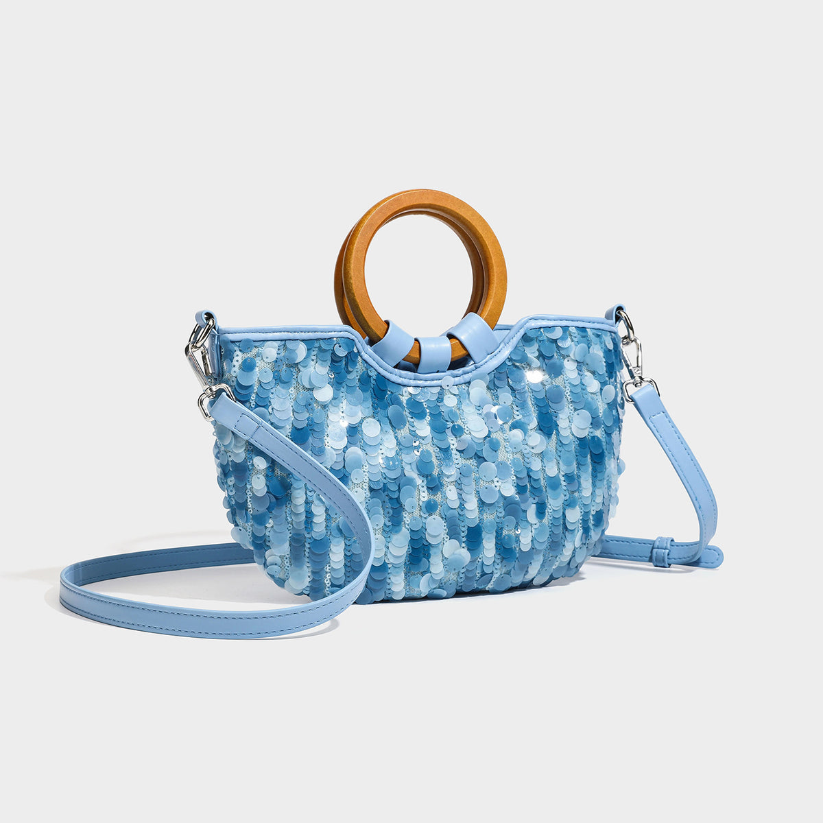 Small sequin half-moon handbag with circular wood-look ring handles and detachable leather-look shoulder strap, detail view 3