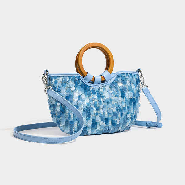 Small sequin half-moon handbag with circular wood-look ring handles and detachable leather-look shoulder strap, detail view 3