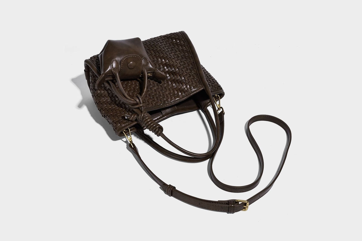 Woven texture open-top tote bag with smooth trim top handles and attached mini drawstring pouch in dark brown, detail view 21