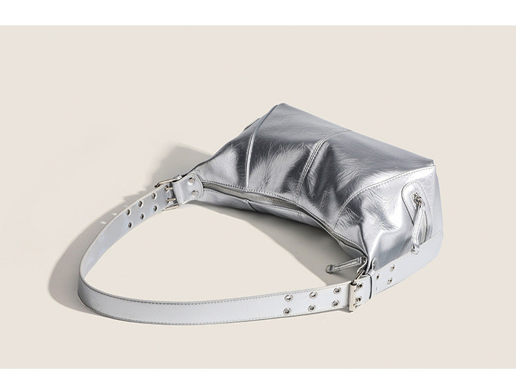 Glossy crinkled mini hobo shoulder bag with studded adjustable strap and silver-tone hardware, detail view 10