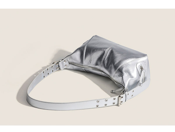 Glossy crinkled mini hobo shoulder bag with studded adjustable strap and silver-tone hardware, detail view 10