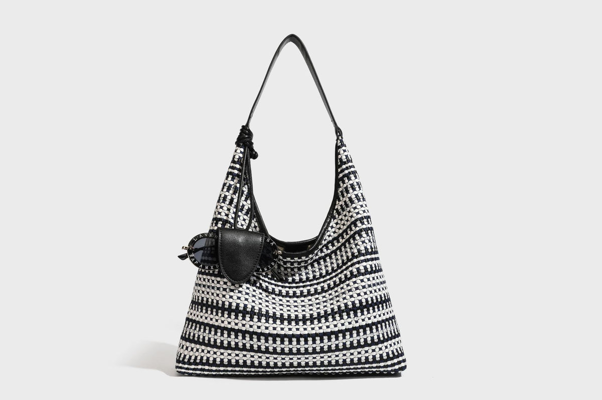 Slouchy woven stripe hobo shoulder bag with black-and-white pattern and leather-look strap, detail view 26