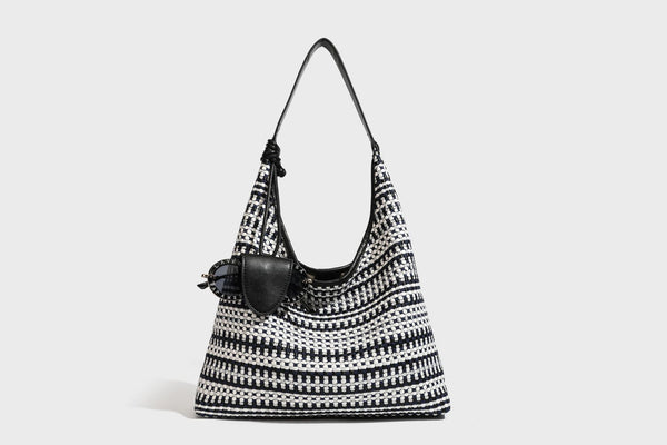 Slouchy woven stripe hobo shoulder bag with black-and-white pattern and leather-look strap, detail view 26