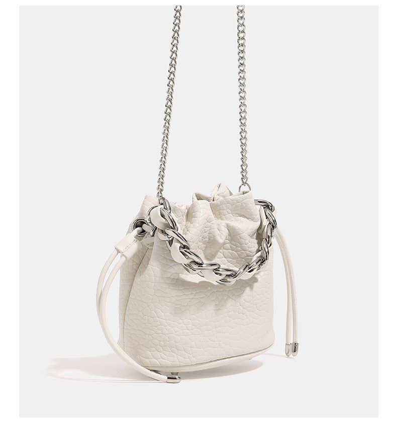 Mini pebbled leather-look bucket bag with chunky silver-tone chain handle and drawstring closure, detail view 14