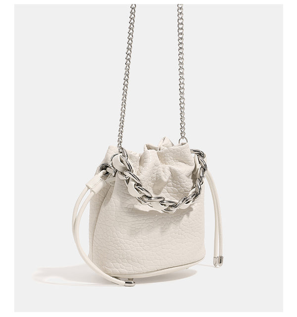 Mini pebbled leather-look bucket bag with chunky silver-tone chain handle and drawstring closure, detail view 14