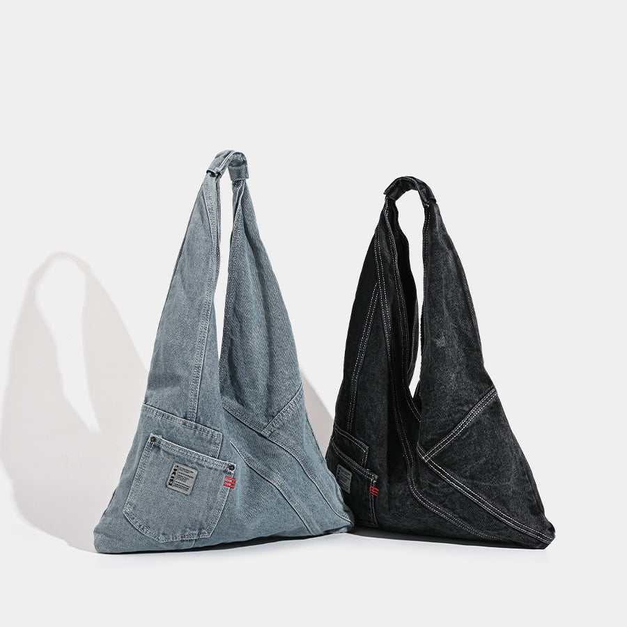 Washed denim slouch tote bag with patch pocket and contrast stitching, detail view 2