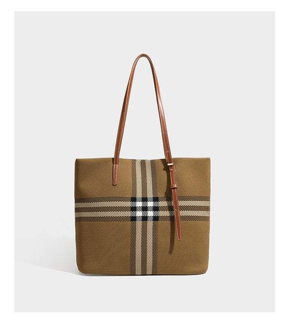 Large structured plaid check tote bag with smooth tan leather-look shoulder straps, attached front zip pouch, and gold-tone