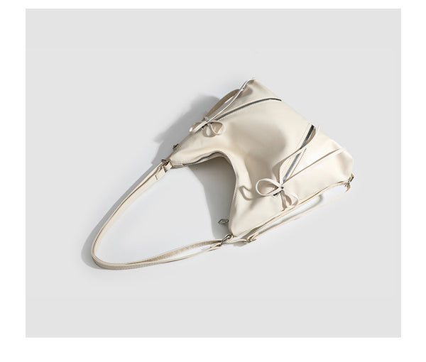Slouchy hobo shoulder bag with bow detail and silver-tone hardware, detail view 21